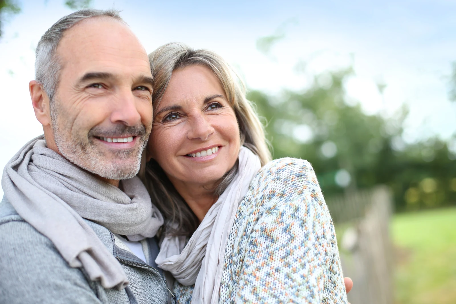 Senior couple smiling together outdoors