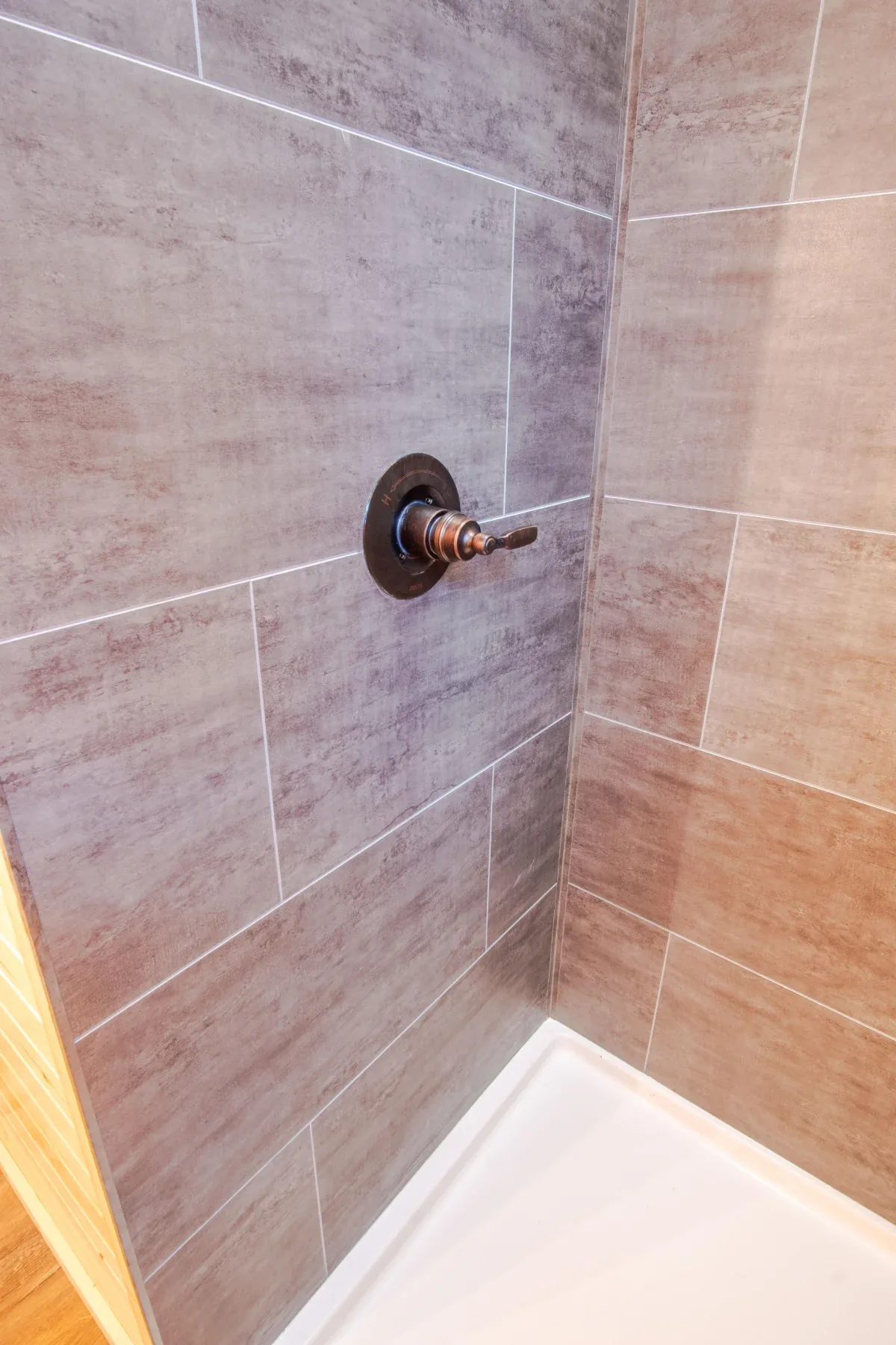 The Outpost bathroom with a tiled shower