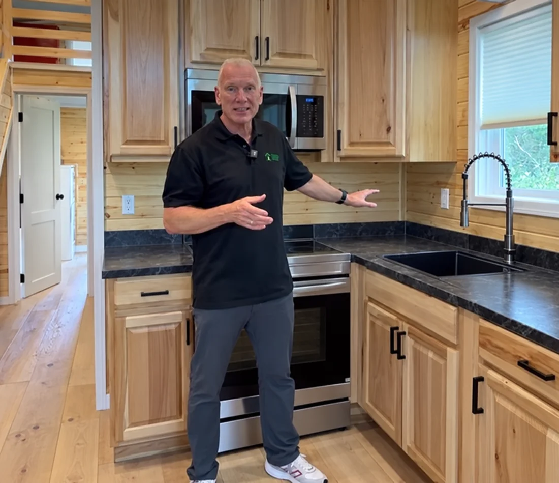 Porter Talbot inside a Snake River Tiny Homes kitchen