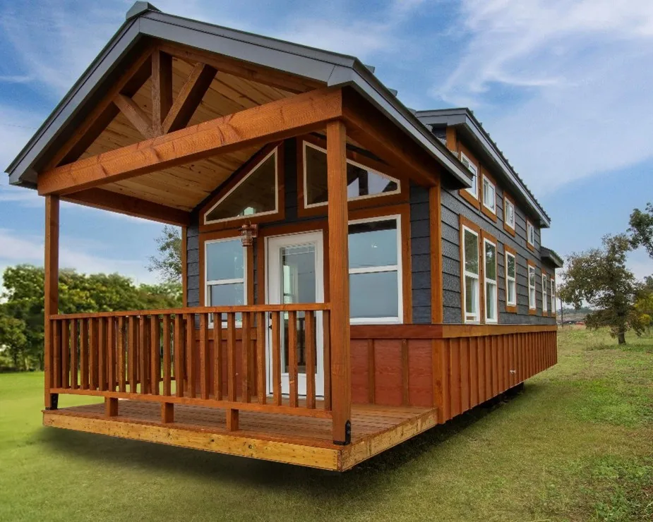 A wood-sided park model tiny home delivered in Montana