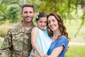 A military family, representing our support for veterans and the military discount