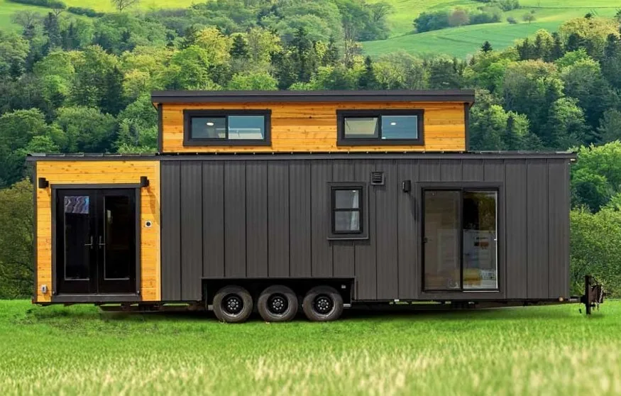 The Tumbleweed Farallon tiny home with a modern dormer front